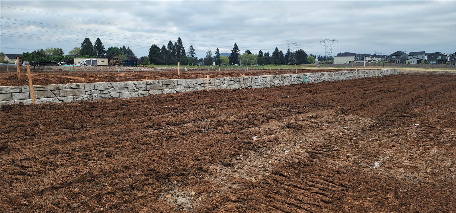 Long Verti-Block wall along a newly graded subdivision