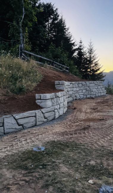 Curving, stepped Verti-Block wall on a hillside lot