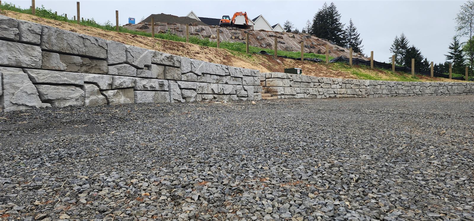 Finished Verti-Block wall along a gravel lot at the Renaissance job