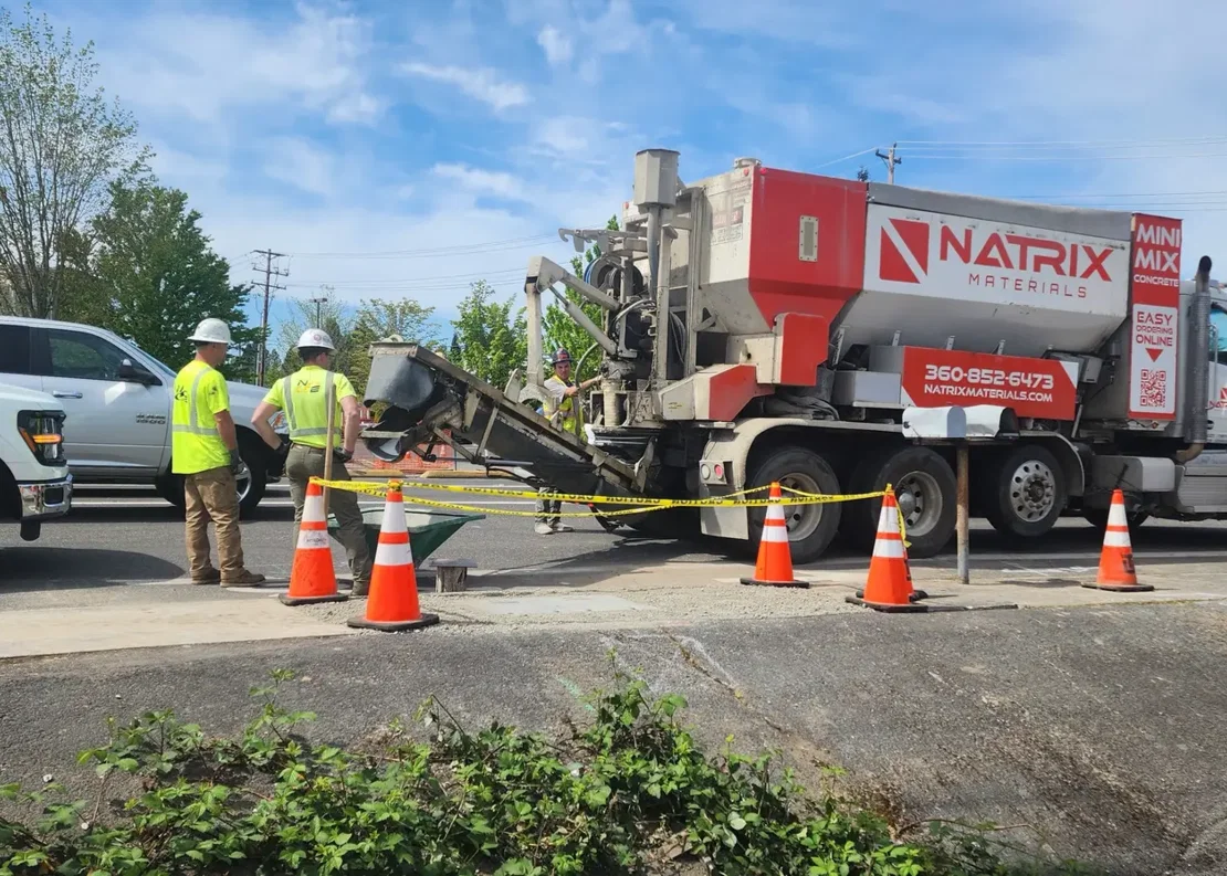 Natrix truck and crew at a coned-off pour