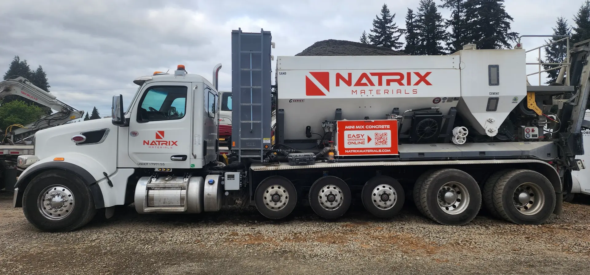 Side view of a Natrix volumetric mixer truck